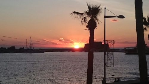 Scenic view of sea at sunset