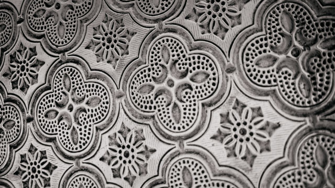 pattern, backgrounds, full frame, no people, design, indoors, floral pattern, close-up, art and craft, geometric shape, shape, craft, creativity, circle, wall - building feature, repetition, decoration, built structure, architecture, black color