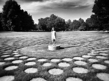 Woman walking on road