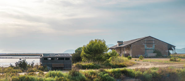 House on field against sky