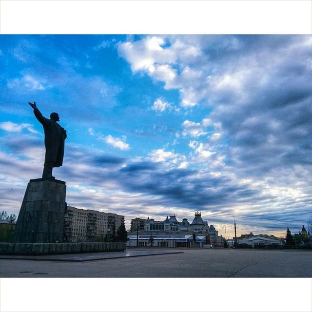 statue, sky, sculpture, human representation, architecture, cloud - sky, built structure, art and craft, building exterior, art, creativity, cloud, transfer print, cloudy, famous place, city, travel destinations, auto post production filter, international landmark