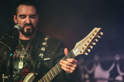 Young man playing guitar