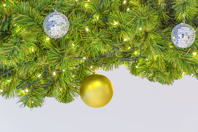 Low angle view of christmas tree against sky