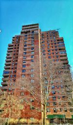 Low angle view of building against blue sky