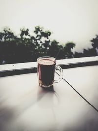 Close-up of coffee cup on table