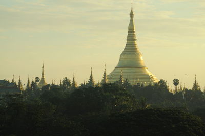 Low angle view of religious structure against the sky