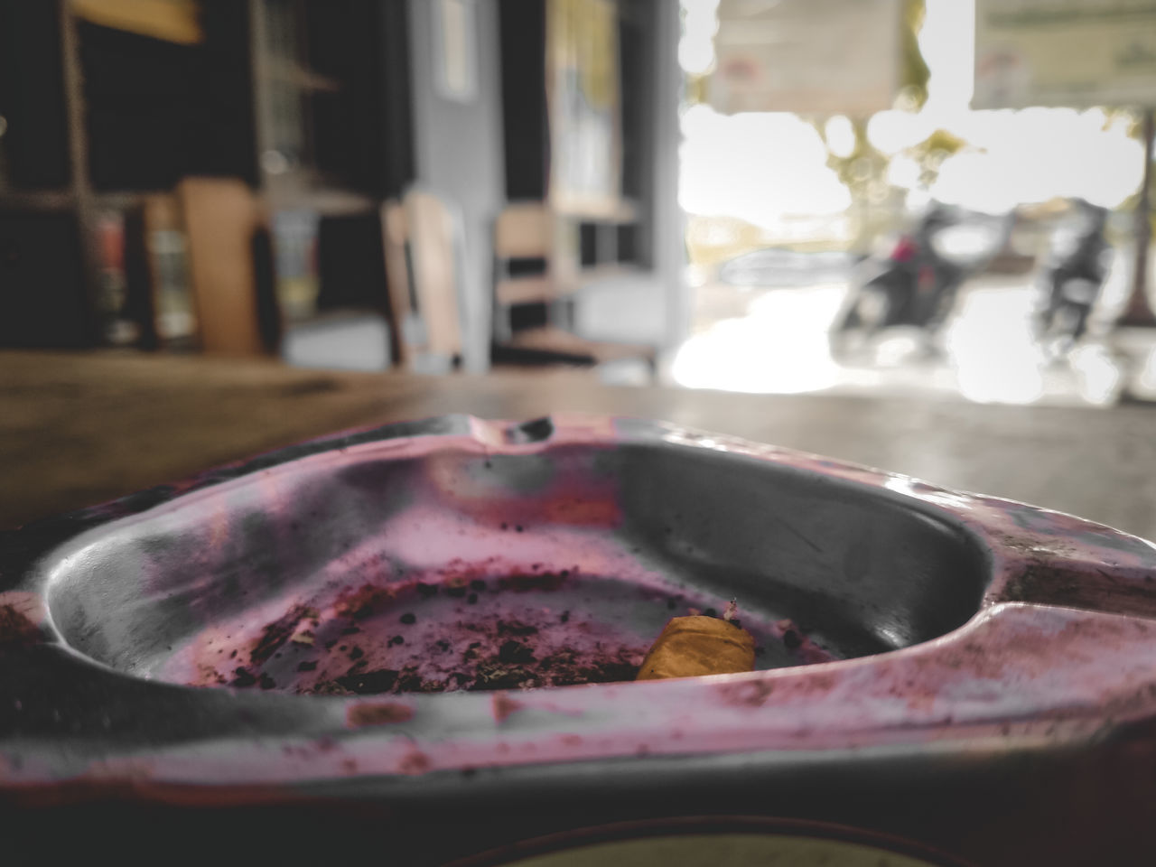 CLOSE-UP OF ICE CREAM ON TABLE