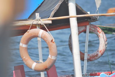 Close-up of rope tied to railing