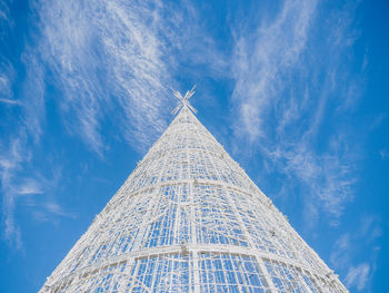 Low angle view of building against cloudy sky