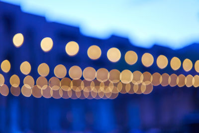 Full frame shot of illuminated lights in city