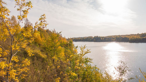 Scenic view of lake against sky during autumn