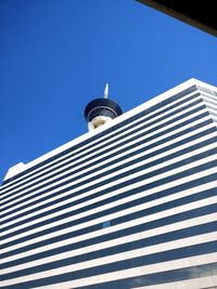 Low angle view of building against blue sky