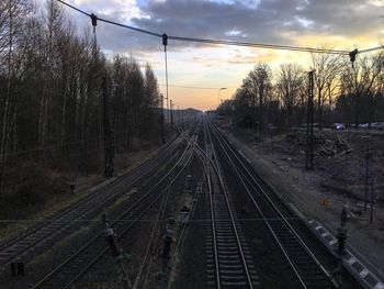 View of railroad tracks at sunset