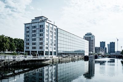 Reflection of buildings in river