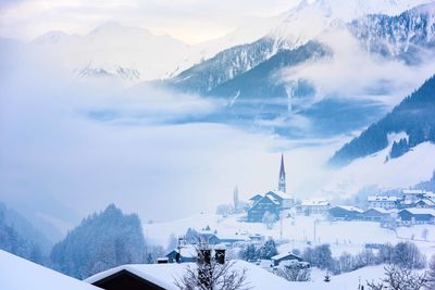 Panoramic view of snowcapped mountains against sky