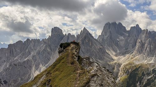 Panoramic view of rocky mountains against sky