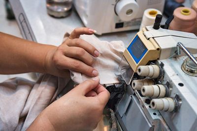 Small business. close-up of working on a sewing machine.