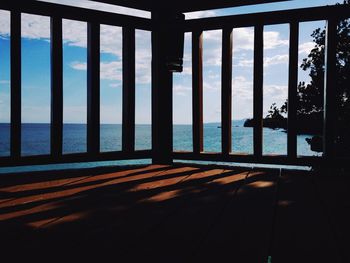 View of sea seen through window