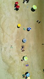 High angle view of toys on beach