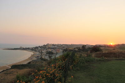 Scenic view of sea against sky during sunset