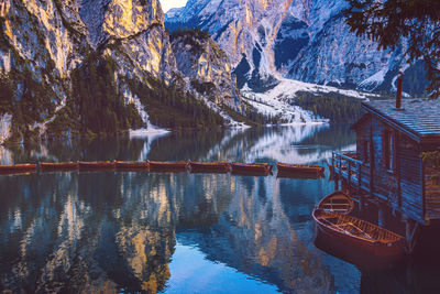 Reflection of trees on lake during winter