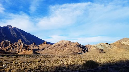 Panoramic view of landscape and mountains against sky