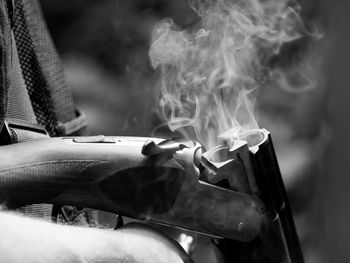 Close-up of woman smoking cigarette