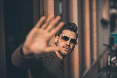 Portrait of young man wearing sunglasses