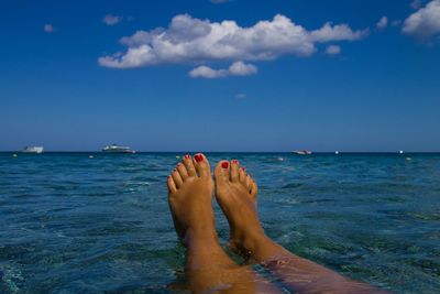 Low section of woman on beach