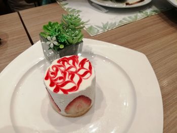 High angle view of cake in plate on table