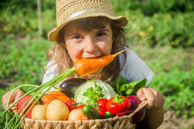 Close-up of young woman holding food