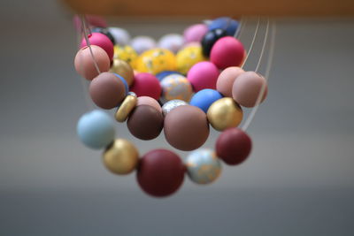 Close-up of multi colored balls on table