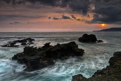 Scenic view of sea against sky during sunset