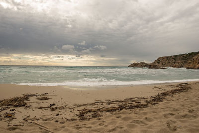 Scenic view of beach against sky