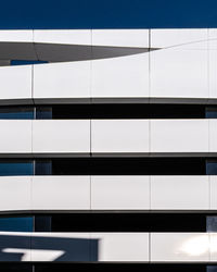 Low angle view of modern building against clear sky