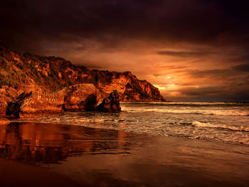 Scenic view of sea against sky during sunset