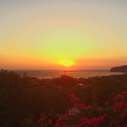 Scenic view of sea at sunset