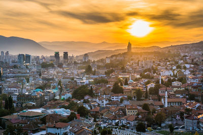 High angle view of townscape against sky during sunset