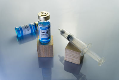 High angle view of bottles on table