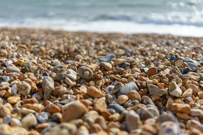 Close-up of pebbles on beach