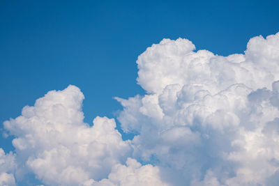 Beautiful view of the cloudy sky. white cumulus beautiful clouds float in the blue sky.