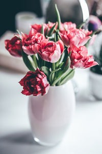 Close-up of flower vase on table