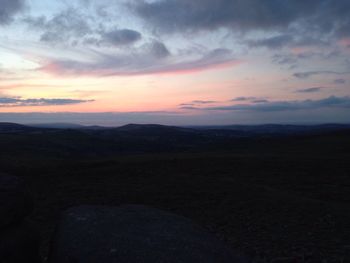 Scenic view of dramatic sky over landscape