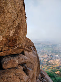 Rock formation on land against sky