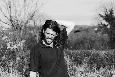 Portrait of young man outdoors