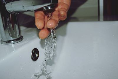 Woman washing hands