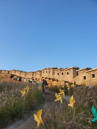 Low angle view of mountain against clear blue sky