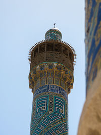 Low angle view of minaret at shah mosque