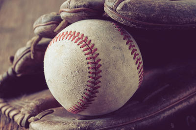 High angle view of baseball equipment on table