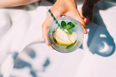 Close-up of hand holding drink